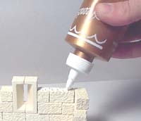 Layer of castle blocks with glue applied
